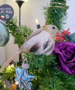 Chim lông xám hồng kẹp cây